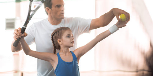 Picture of a dad teaching his daughter to be independent with procedural language.