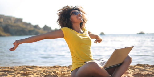 Become Happy and Single Picture of a women on a beach who is showing that she is happy and single.